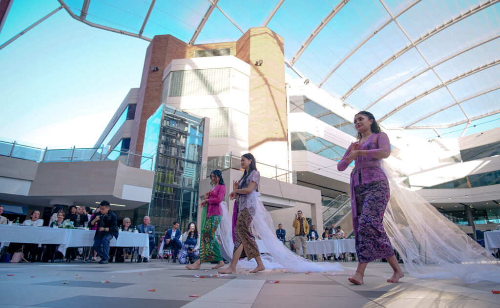 Guests photographed at a Perth community event